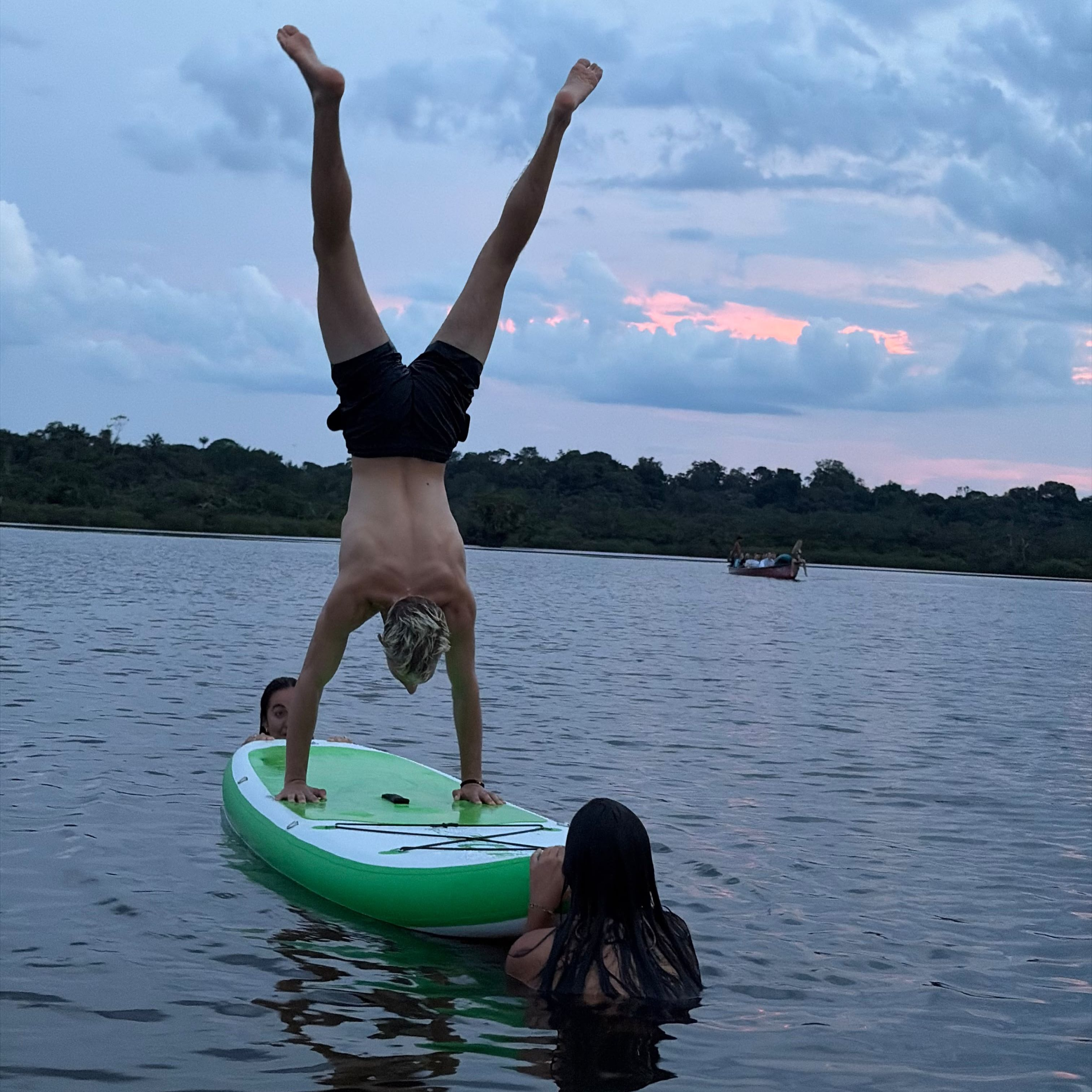SWIMMING WITH PADDLE BOARDS OF THE CUYABENO LODGE IN LAKE CUYABENO