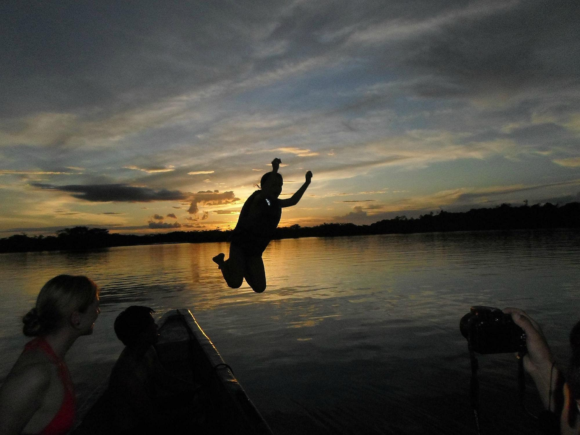 SUNSET SWIM IN THE CUYABENO LAKE FROM THE CUYABENO LODGE